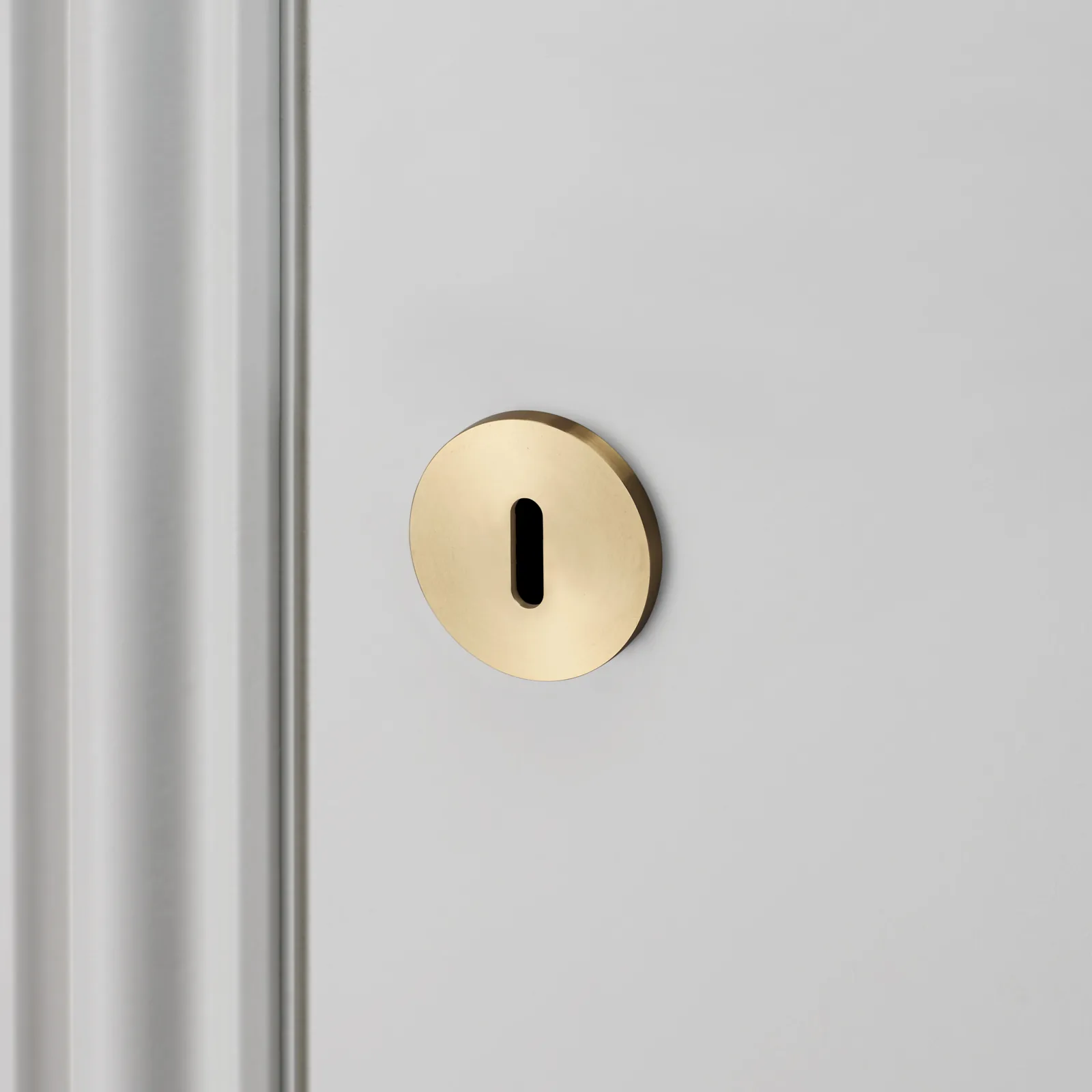 Escutcheon plate, Swiss, circular profile, Brass