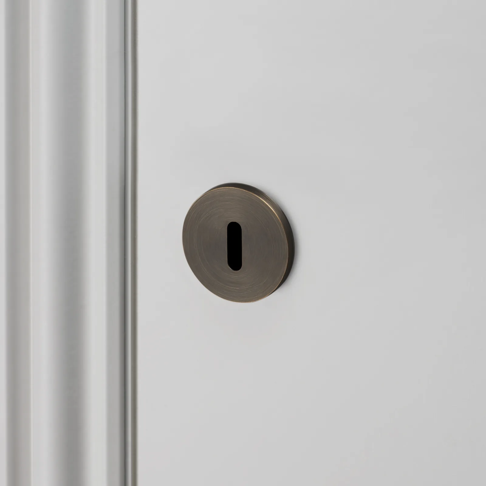 Escutcheon plate, Swiss, circular profile, Smoked Bronze